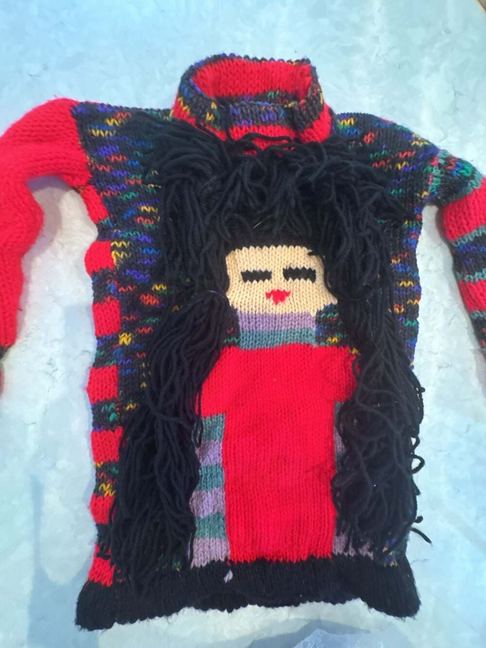 Hand-Knitted Doll Sweater with Black Hair and Red Dress. Girls S